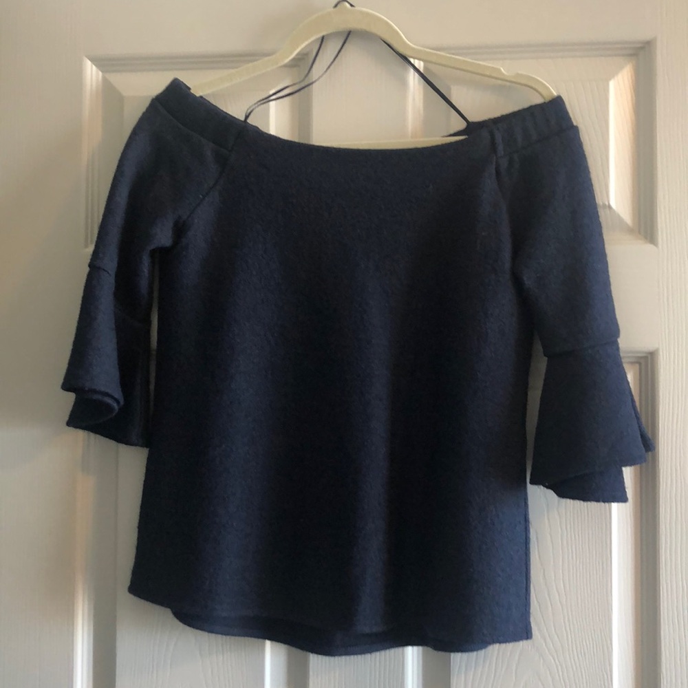 Dark blue off the shoulder sweater.